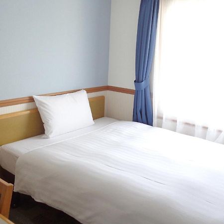 Toyoko Inn Okayama Eki Nishi Guchi Hiroba Exterior foto