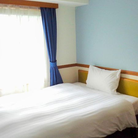 Toyoko Inn Okayama Eki Nishi Guchi Hiroba Exterior foto